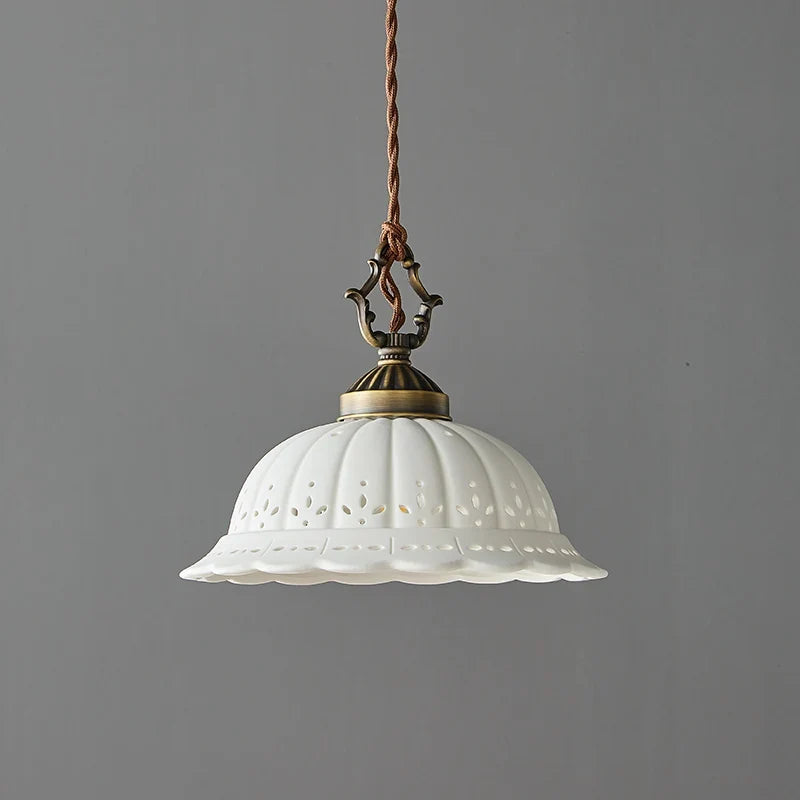 Perforated Ceramic Pendant Light with Antique Brass Fittings