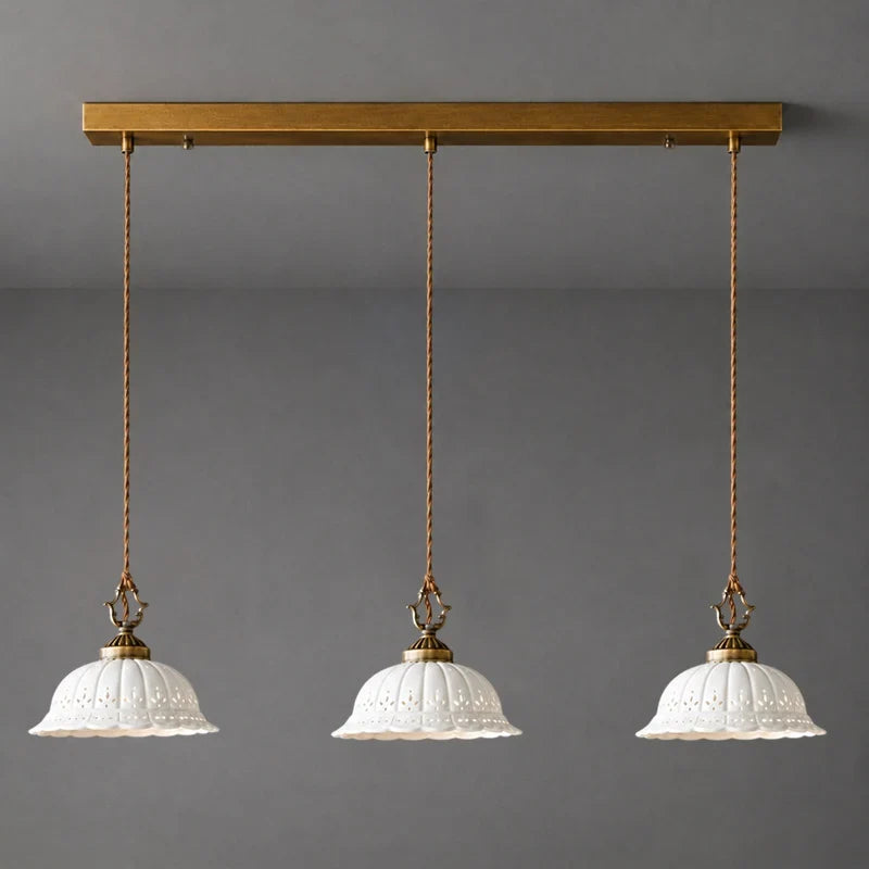 Perforated Ceramic Pendant Light with Antique Brass Fittings