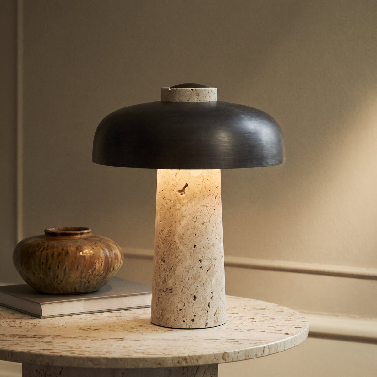 Stone and shadow on the sideboard